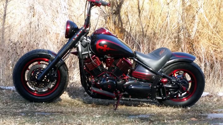 yamaha v-star classic bobber in the woods