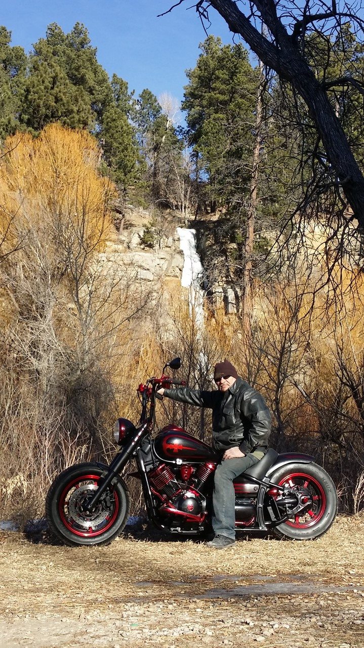 yamaha v-star classic bobber in the woods